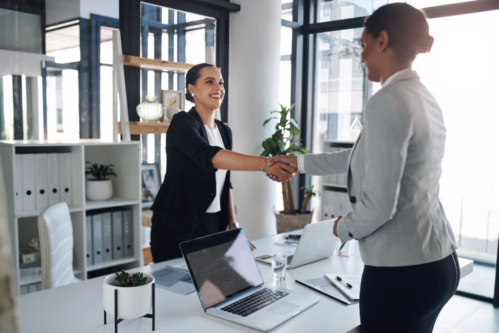 office business people smile with handshake agreement finance deal partnership accounting firm accountant happy manager with shaking hands teamwork audit solution thank you